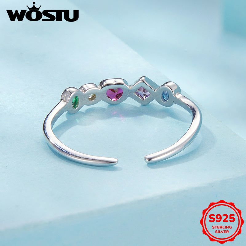 This open ring for women showcases a vibrant heart design reminiscent of Japanese and Korean Y2K styles. Crafted from 925 silver and adorned with synthetic zirconia, it weighs 2.5G. Ideal for daily wear or as a thoughtful gift for a girlfriend, partner