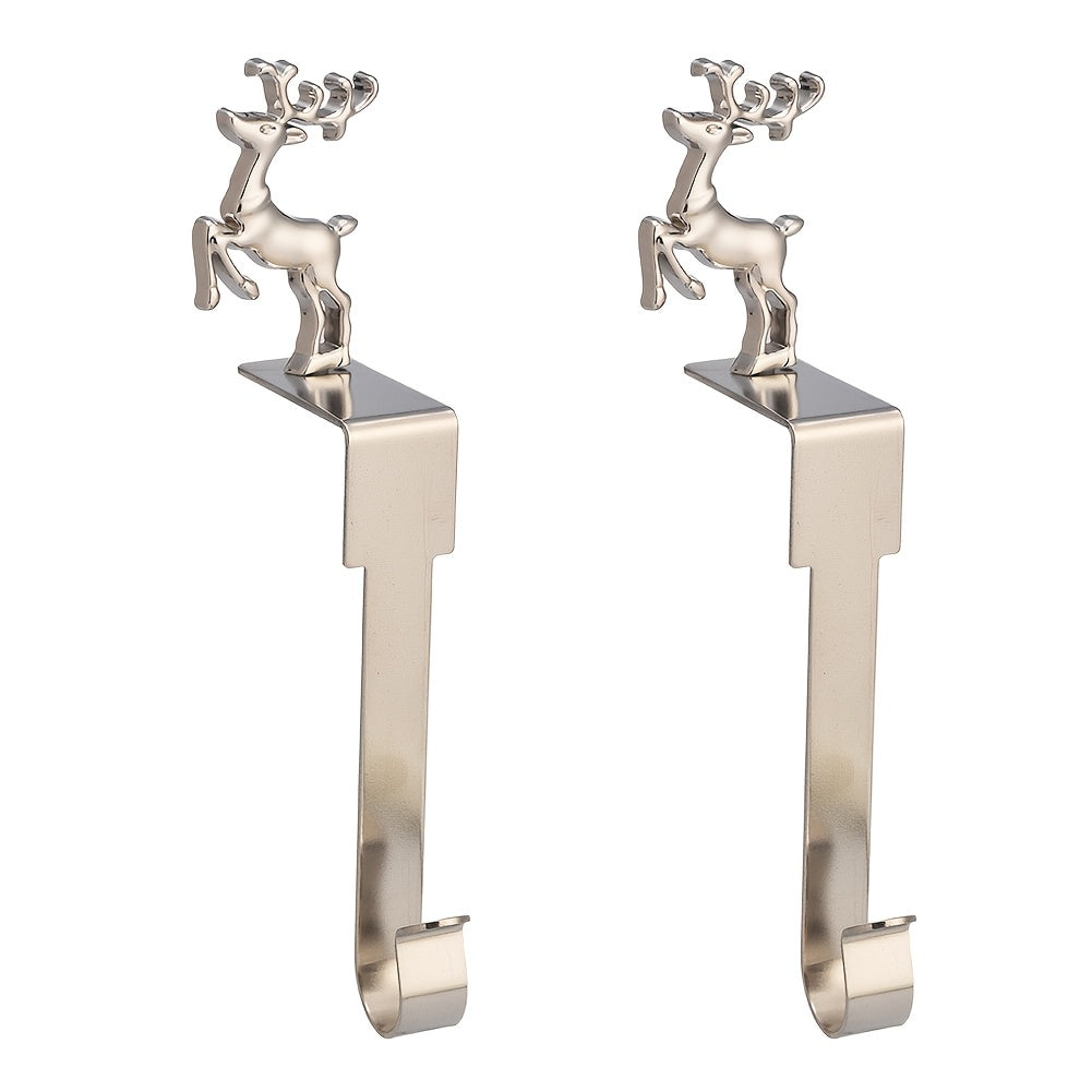 Set of 2 Christmas Mantel Stocking Holders - Stainless Steel with Silvery Finish, Decorated with Santa Claus, Snowman, Elk, and Snowflake Designs, Complete with Hooks