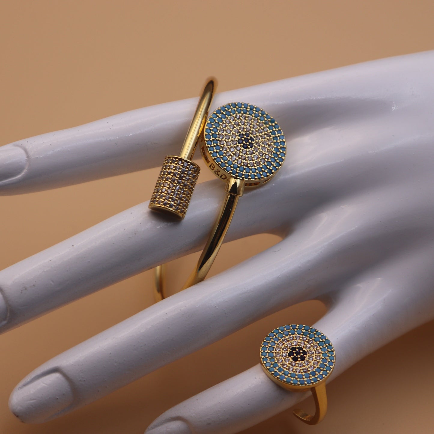 24K gold plated bangle with ring featuring elegant turquoise inlay, ideal for special occasions and festivities. Crafted from high-quality alloy for long-lasting wear.