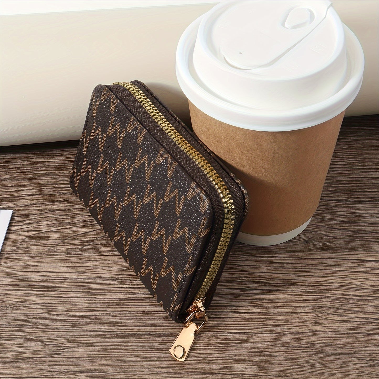 Compact and stylish synthetic leather credit card holder with zipper in brown and black herringbone pattern. Includes golden zippers, ideal for keys and cash. Lightweight and portable