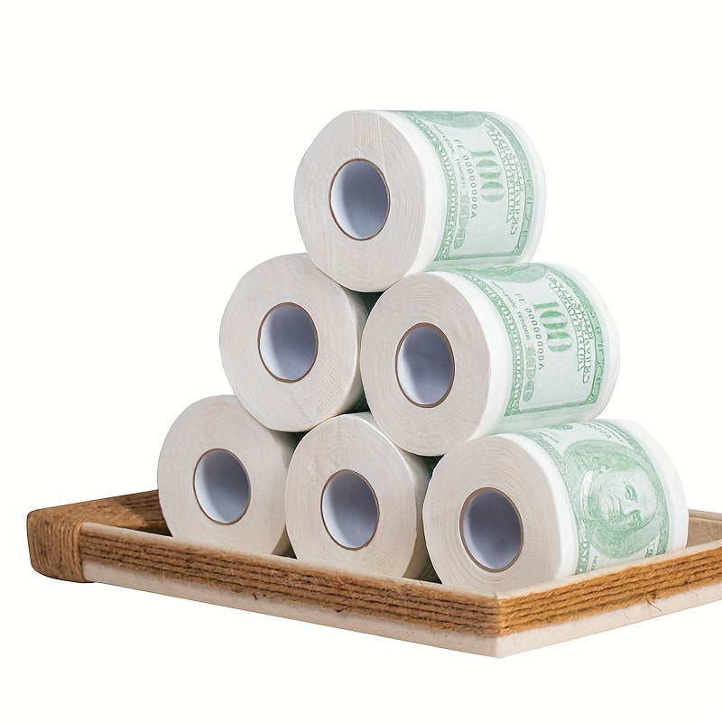 Pack of two-ply paper towels designed to resemble $100 bills, perfect for use as decorative toilet paper at parties.