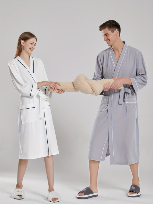 Unisex Japanese-style bathrobe with waffle weave, pockets, and belt for all-season comfort.