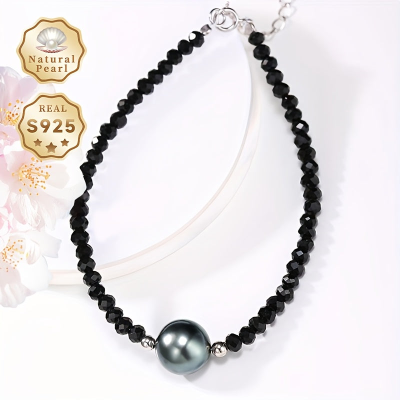 Adorn your wrist with the exquisite MUFAN Elegant Vintage Style Sea Gemstone Bracelet featuring a stunning 9-10mm High Luster Round Black Tahitian Gem. Crafted with Sterling Silver 925 Beads, this bracelet is adorned with the June Birthstone and comes