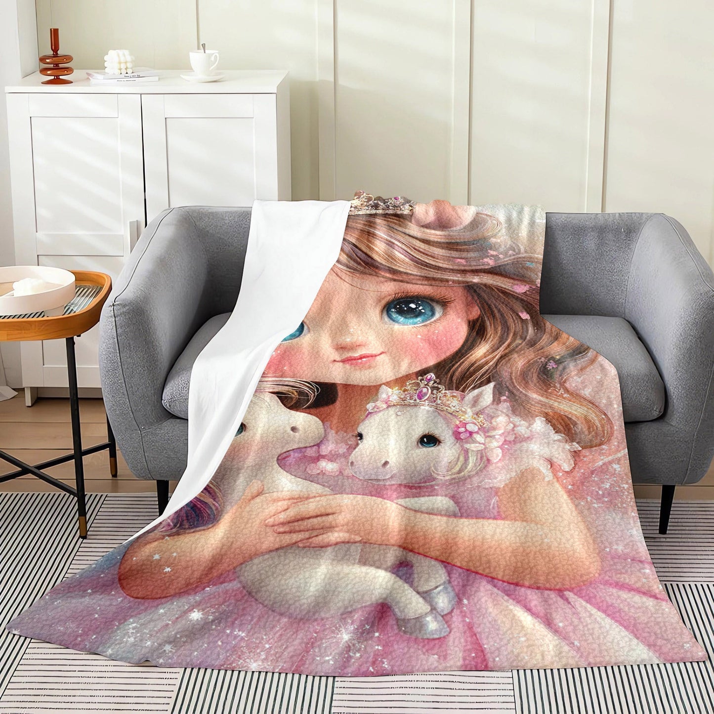 Modern flannel throw blanket featuring an enchanted girl and dreamy unicorns print. Hypoallergenic and suitable for all seasons, this multipurpose bedding is made of digital print polyester. Perfect for use on the bed, sofa, or while camping, it also