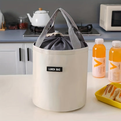 '- Large round lunch bag with cylinder insulation, made of aluminum foil for portability and to keep meals warm at work.