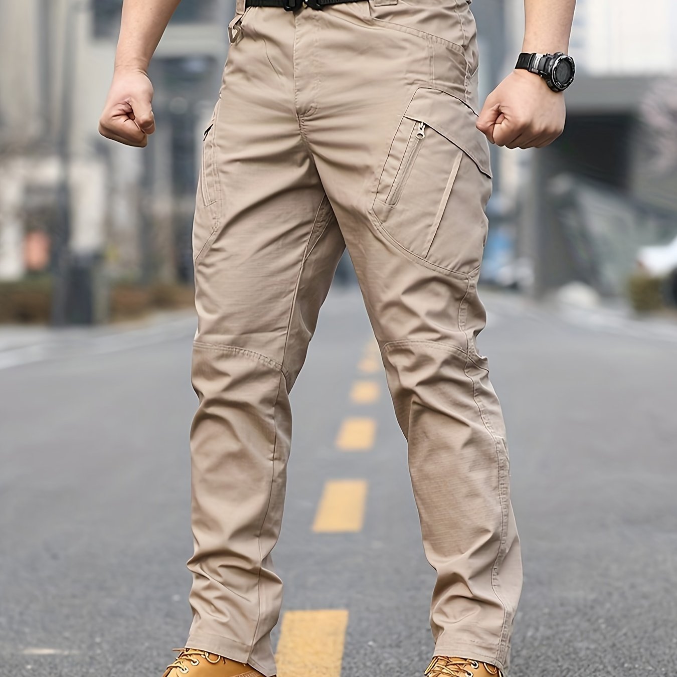 Men's slim combat pants for military training and outdoor activities, featuring a casual and tactical design.