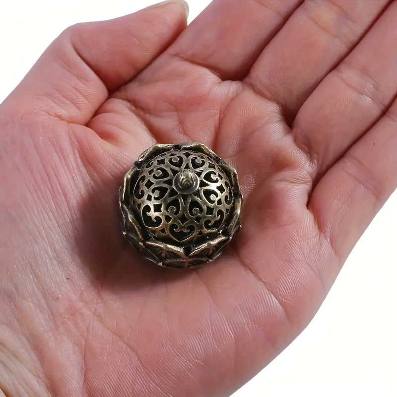 1 Mini Hollow Lotus Incense Burner in Antique Bronze, also serving as an incense holder for indoor decor.