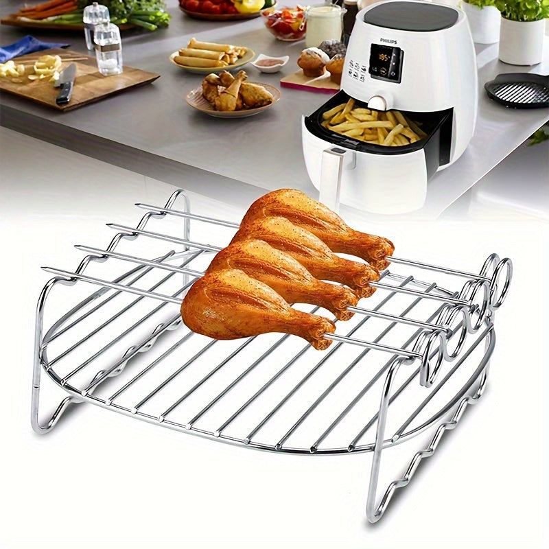 Set of stainless steel air fryer racks, featuring a round dual layer skewer holder. Compatible with most air fryers, these versatile roasting and grilling racks come with skewers for cooking and are safe for use in the dishwasher.