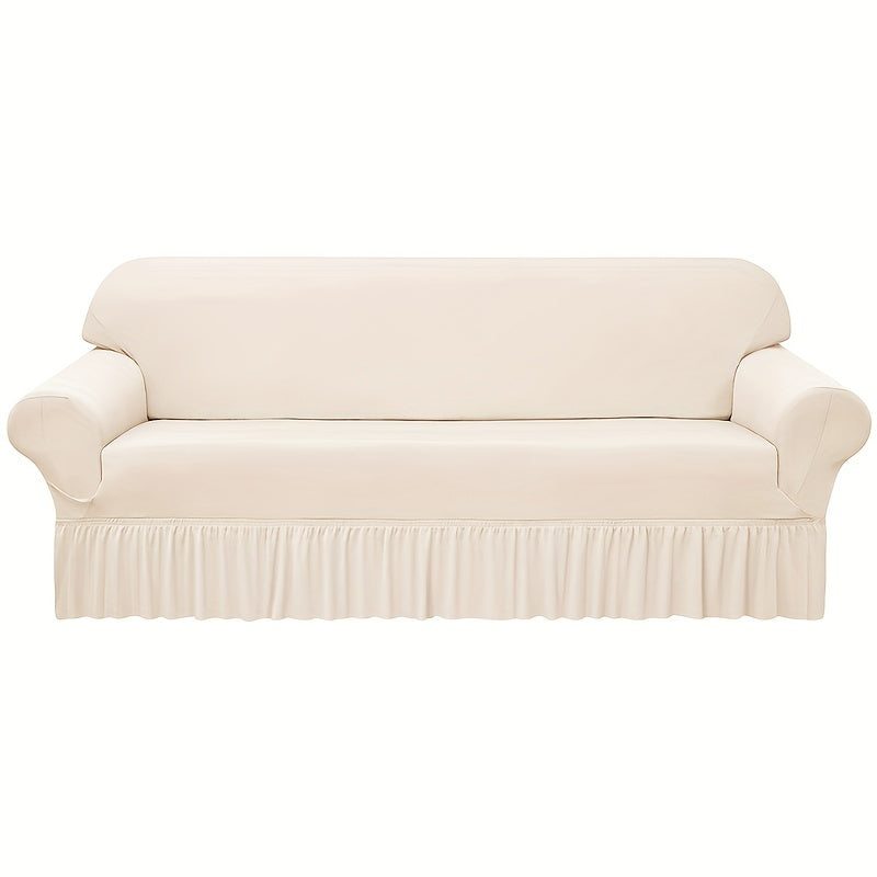 Elastic waterproof sofa slipcover with skirt for all seasons, ideal furniture protection for home and office.