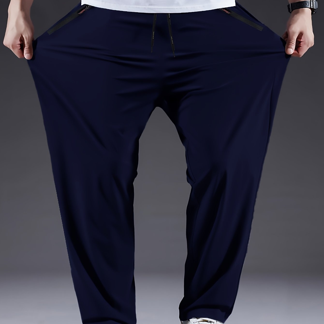 Men's plus size black polyester casual pants, lightweight, quick-dry, and breathable. Machine washable, suitable for sports and fitness. Plus size.