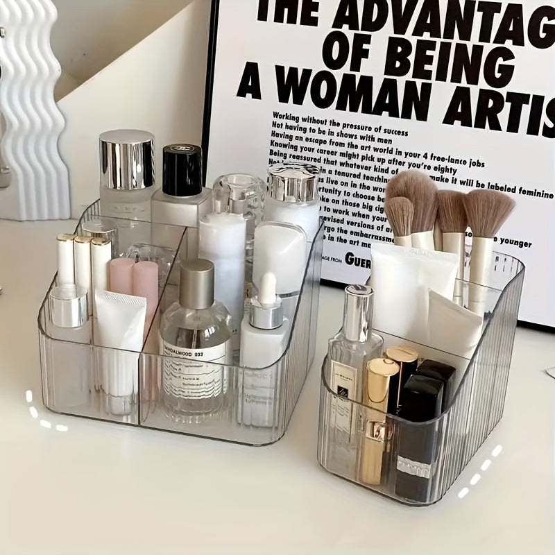 Clear acrylic makeup organizer with dividers for portable and adjustable cosmetic storage - perfect for lipstick, eyeshadow, powder, and vanity accessories. Ribbed texture and sleek design