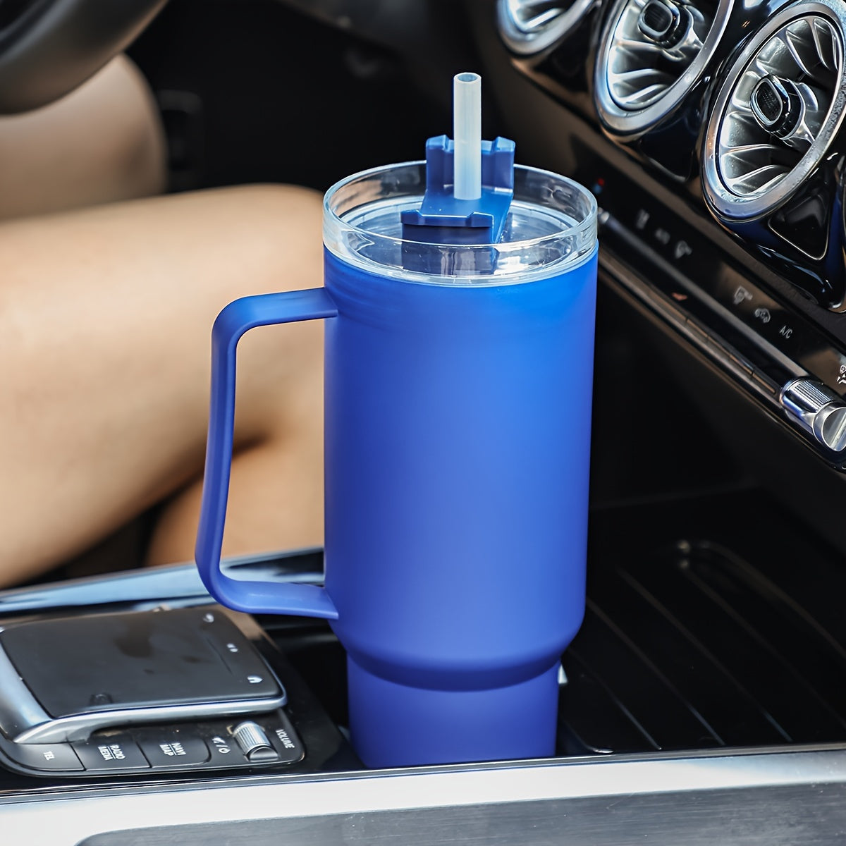 White polycarbonate tumbler with handle, large capacity for car and office use.