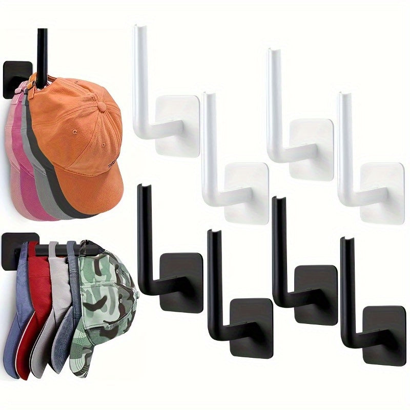 Pack of four plastic hat hooks that are self-adhesive and punch-free - they can be easily mounted on the ceiling without the need for electricity. These hooks are ideal for organizing your entryway, bathroom, or bedroom in a space-efficient manner using