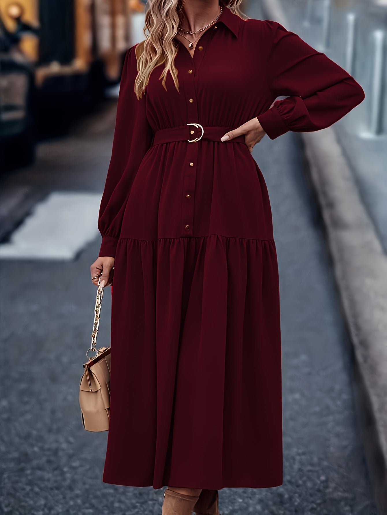 Middle-Eastern style polyester shirt dress with lantern sleeves, ruffled hem, and button details - A-line woven midi dress suitable for spring/fall.