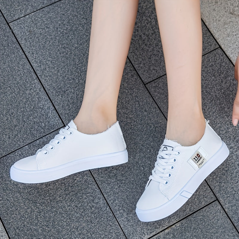 Casual lace-up sneakers for women with solid color, soft sole, and lightweight design.