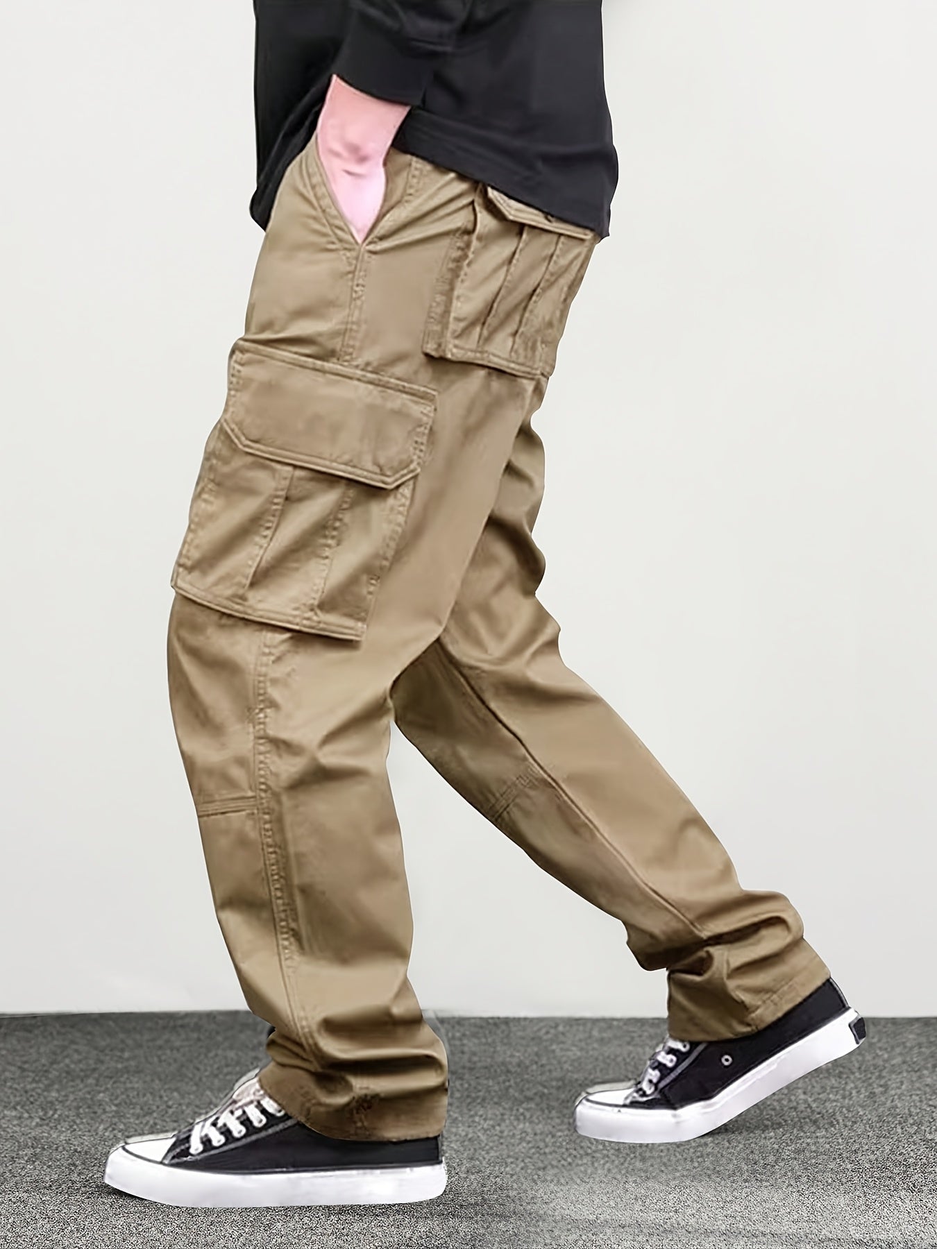 Men's classic solid color cargo pants with multiple pockets, loose fit, and drawstring waist. Perfect for outdoor activities, fishing, and streetwear.