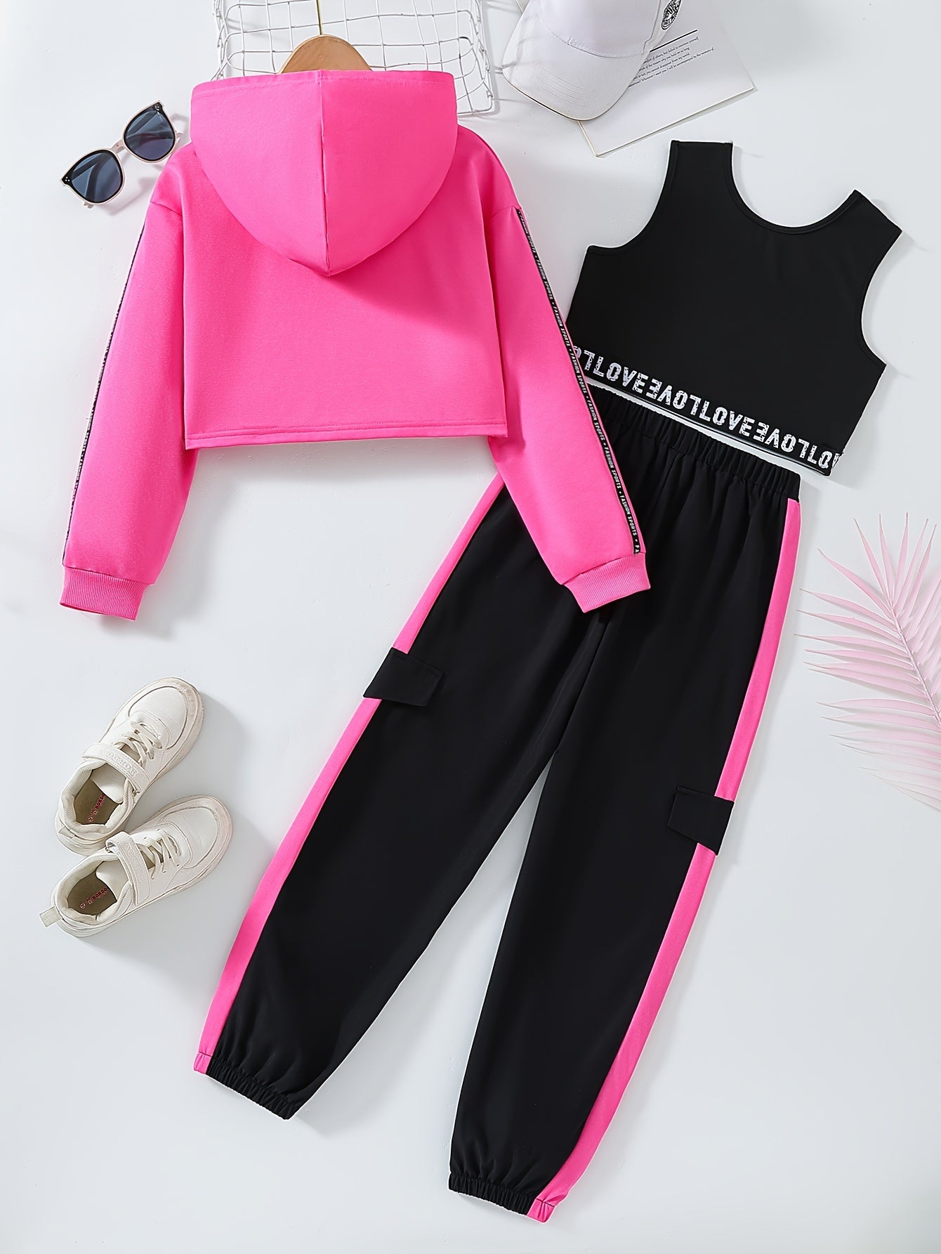 3-piece sporty co-ords set for active girls, includes crop hoodie, tank top with letter tape, and sweatpants, perfect for casual outdoor wear or as a gift.