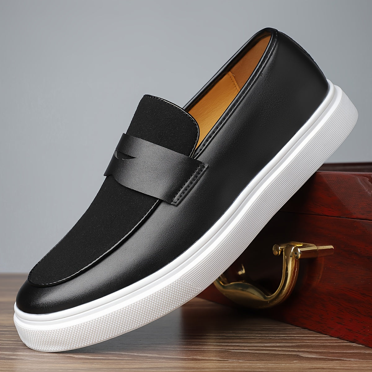 Men's preppy slip-on sneakers with low top design in solid color, featuring PU upper and inner, rubber sole, and round toe for daily wear.