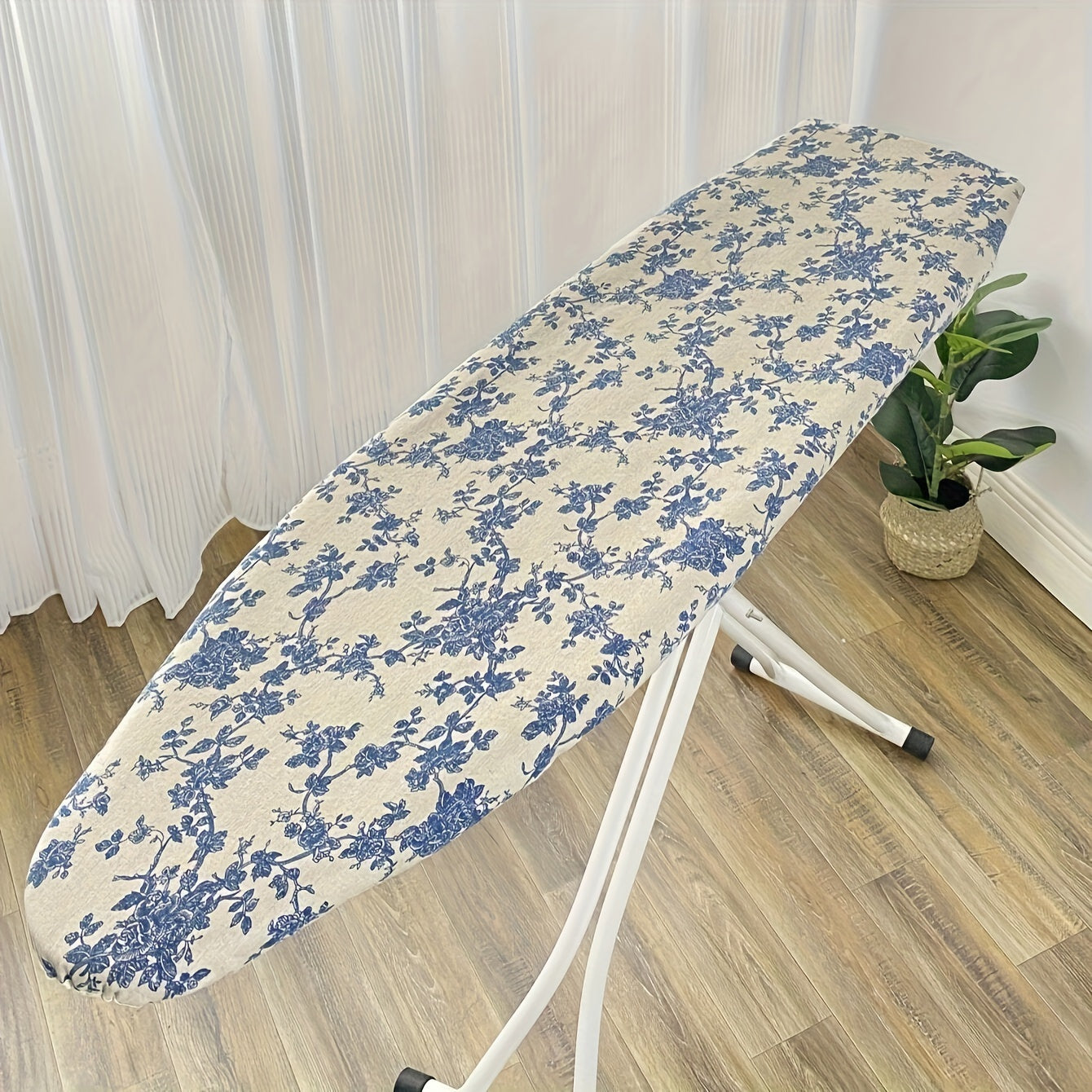 Get the Blue Rose Ironing Board Cover - Made of Strong Polyester Material, Resistant to Heat and Stains with a Secure Nose Pocket Design, Non-Slip Grip, Size 139.7cmx20