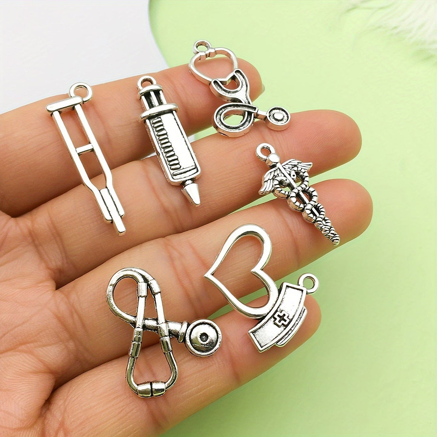 Set of 40 Nurse Charms Including Stethoscope, Syringe, Nurse Pins, and Hat Jewelry - Perfect for DIY Necklace and Bracelet Crafts with Alloy Enamel Medical Pendants - Trendy Fashion Accessories