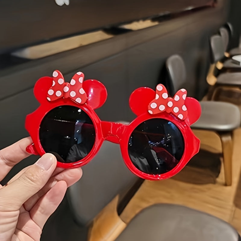 Minnie Mouse cat eye glasses in red and black with polka dot detail, perfect for women, made of plastic.