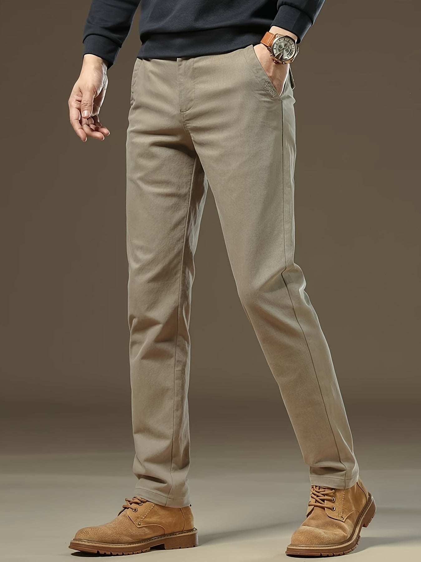 Stylish men's dress pants in khaki color with classic fit and stretch, suitable for business casual wear in spring/fall season.