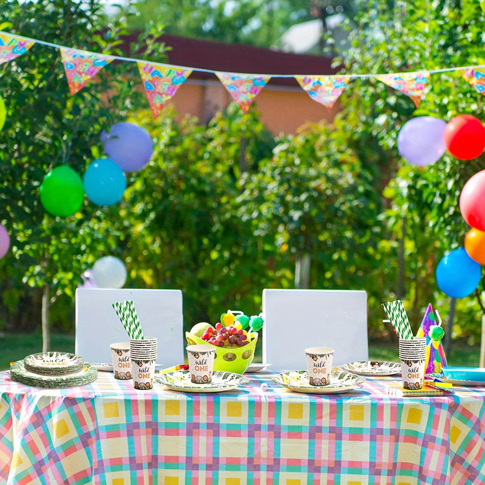 Celebrate with 68 pieces of Wild One birthday decorations! This Jungle theme party set includes paper plates, cups, and napkins, perfect for a 1st birthday celebration. Add some fun animal jungle decorations to your party table with this dinnerware set.