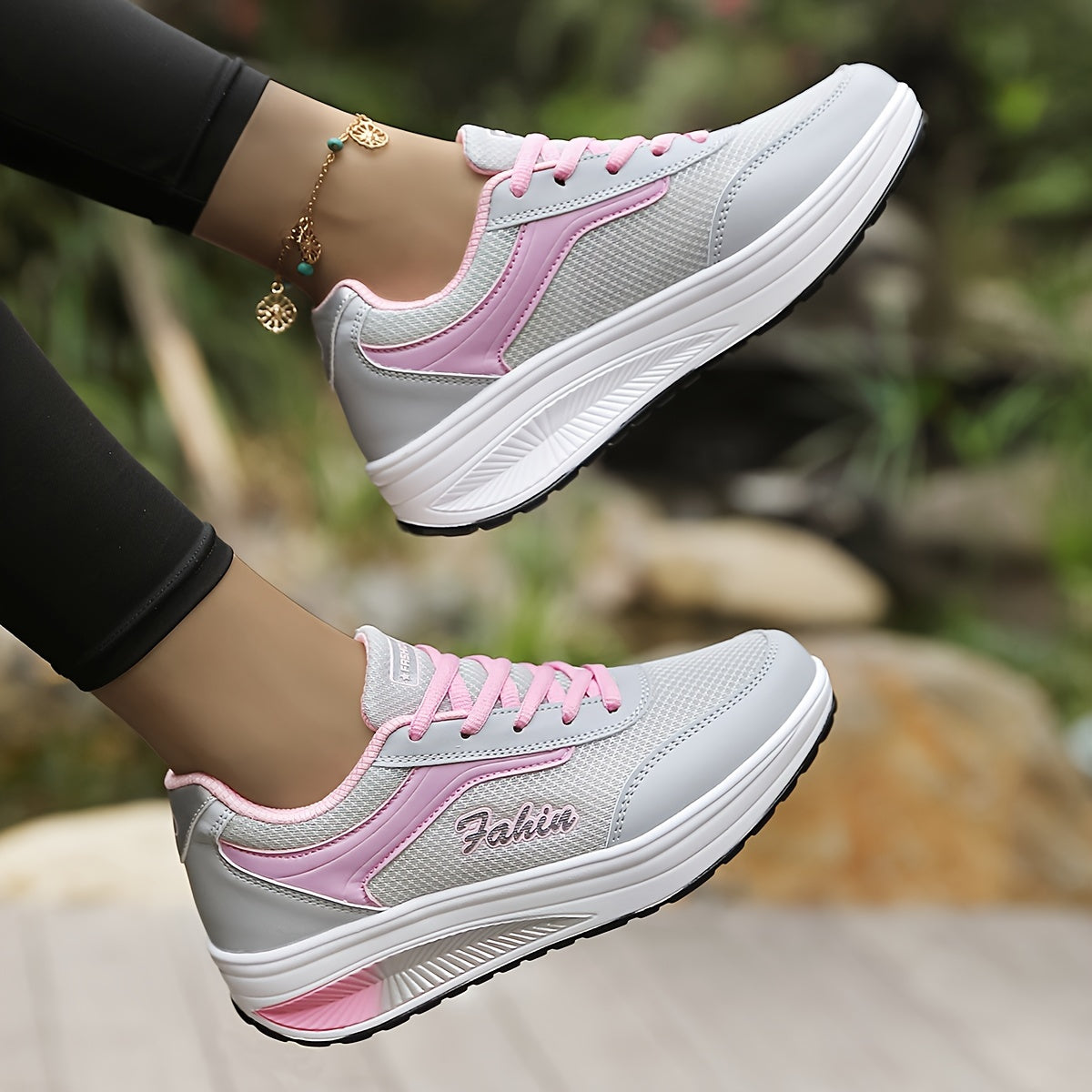 Women's platform sneakers with breathable mesh, lace-up design, and comfortable fit in plus size