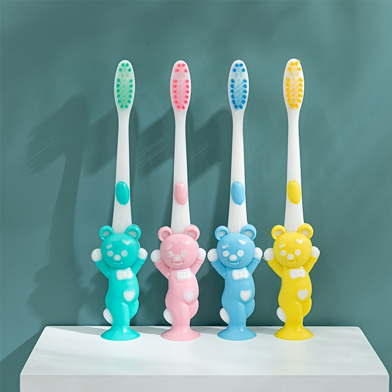 4 soft-bristled toothbrushes with charcoal and cute animal designs for teeth care.