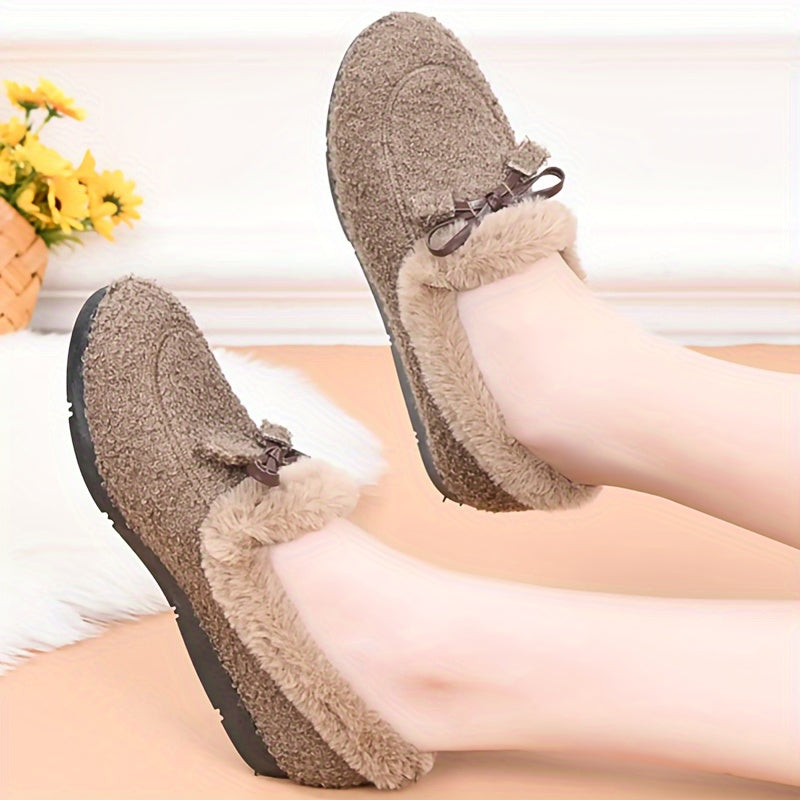 Women's cozy loafers with a solid color design, bow accent, and rubber sole. Made with microfiber upper and lining, flat head for warmth and non-slip comfort. Fashionable and cozy home