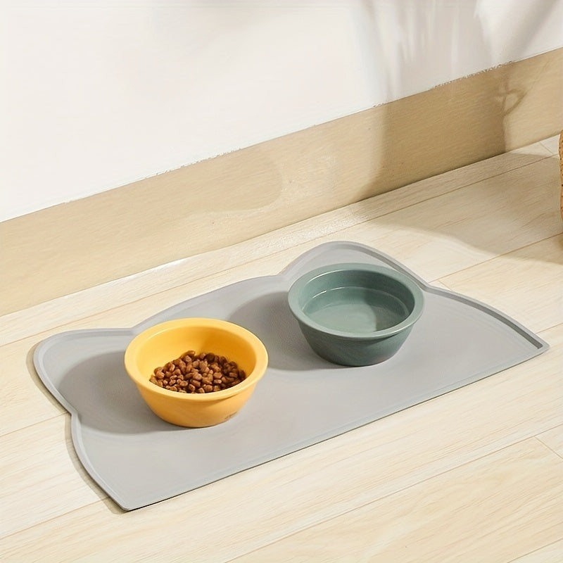 Silicone cat feeding mat prevents spills and slips, easy cleaning, essential for cats and dogs.