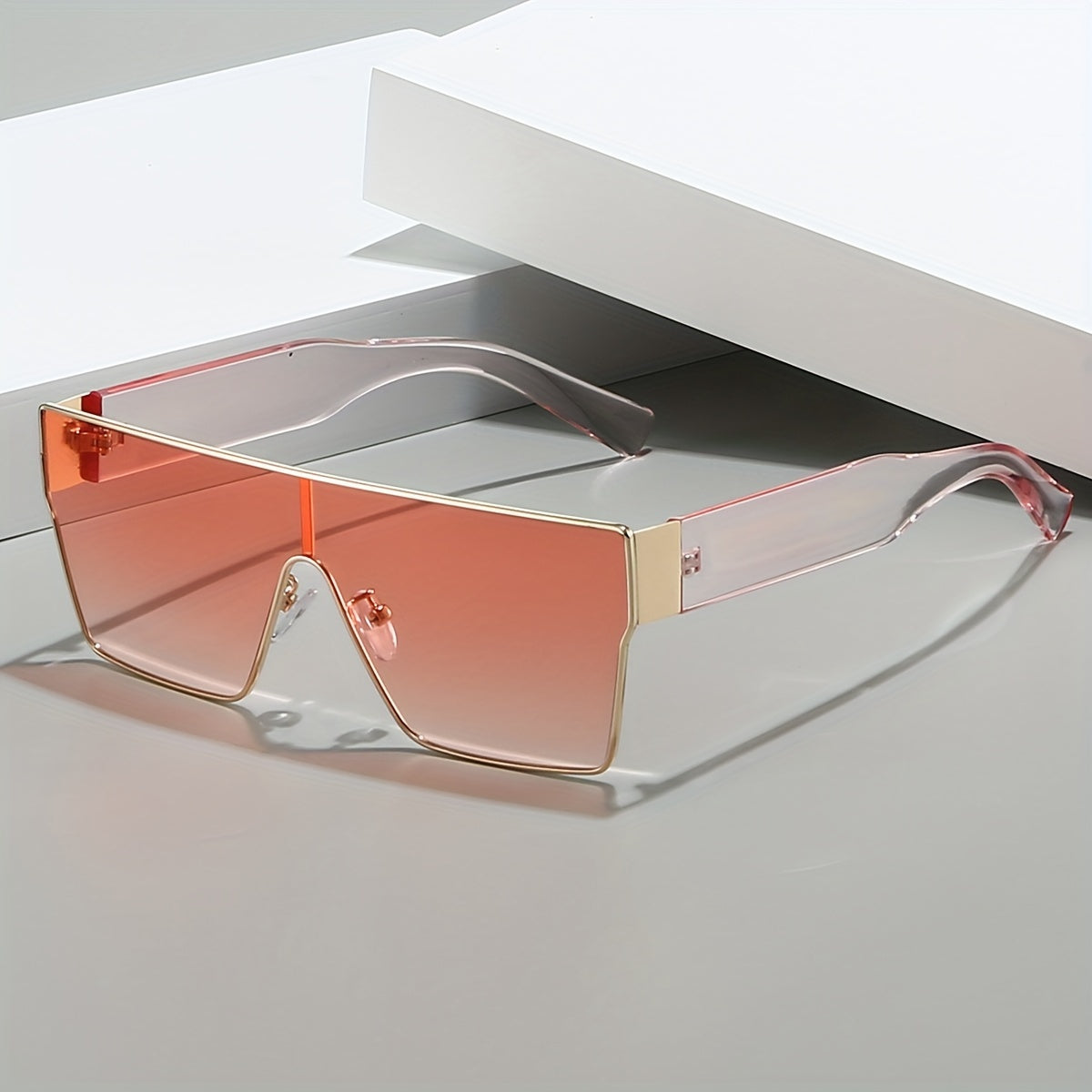 Hiking glasses with metal frame and anti-reflective lenses, featuring a trendy square design for unisex fashion.