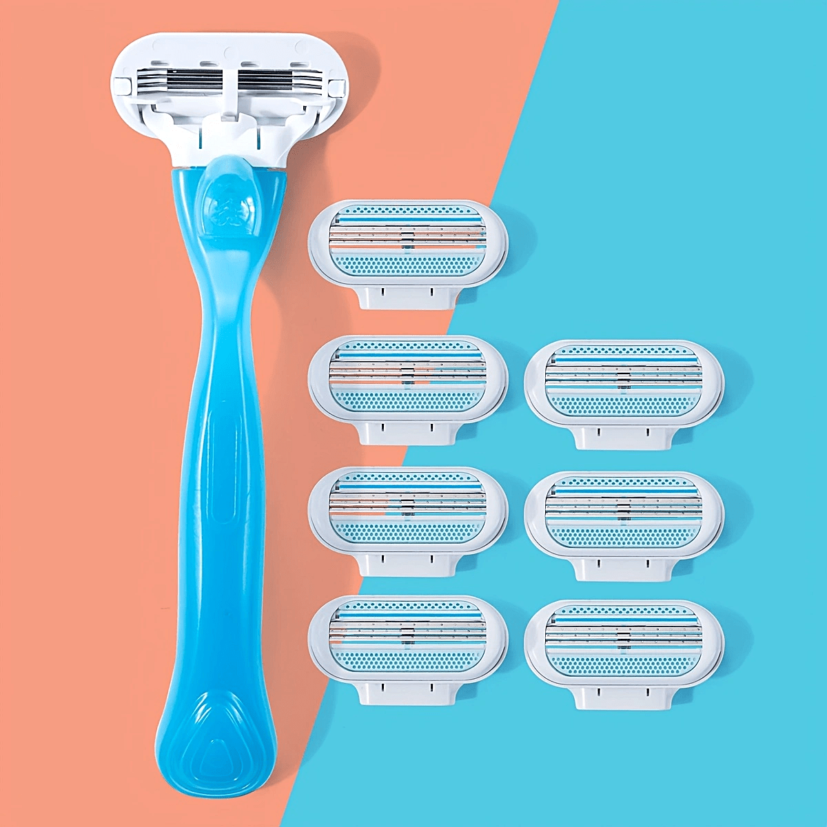 Hypoallergenic manual hair removal razor kit with blue handle + 8 white blades, stainless steel for smooth, normal skin.