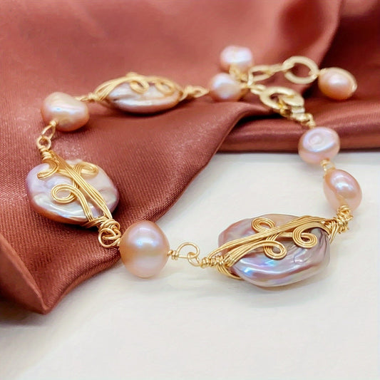 Vintage elegant style bracelet featuring pretty freshwater pearls, perfect for women to wear to a summer banquet. Hand chain design adds a touch of sophistication.