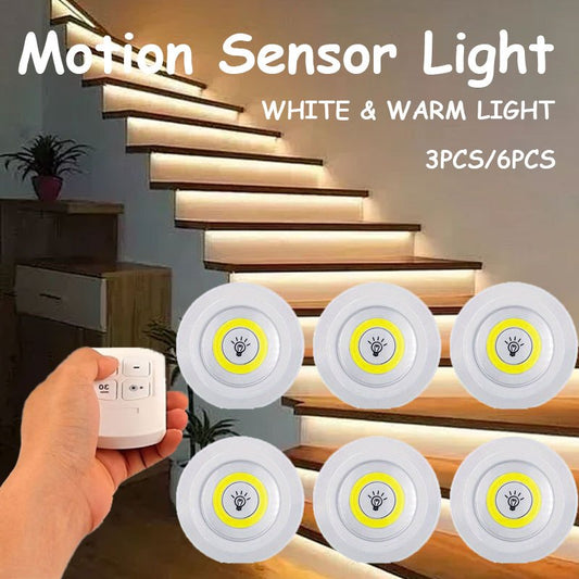 6 Motion Sensor LED Lights in 3 piece set, wireless COB under-cabinet lighting made of plastic. Battery powered with remote control for use in wardrobe, stairs, kitchen. Batteries not