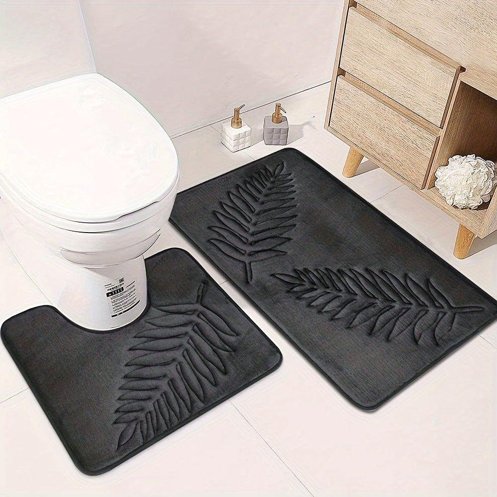 2-piece set of plush memory foam bathroom mats with a fern leaf design. These mats are non-slip, absorbent, and machine washable, making them perfect for adding a touch of style to your home decor.