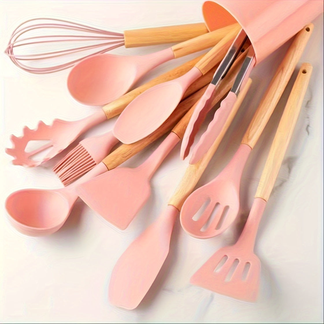 Set of 12 silicone utensils with khaki color and wooden handles, ensuring safety while cooking. These non-stick kitchen tools are washable and modern, providing a range of cookware and gadgets for your kitchen.