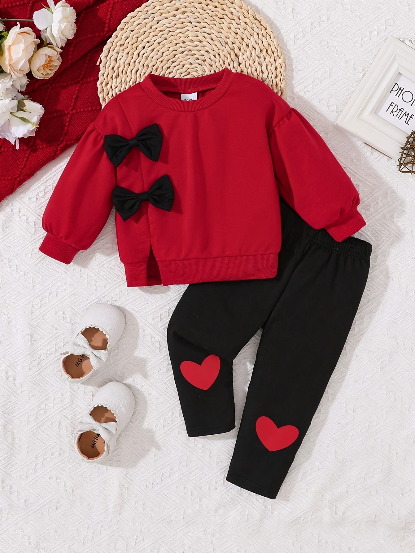 Cozy knit sweatshirt and heart print pants set for girls, machine washable and ideal for fall/winter outdoor activities.