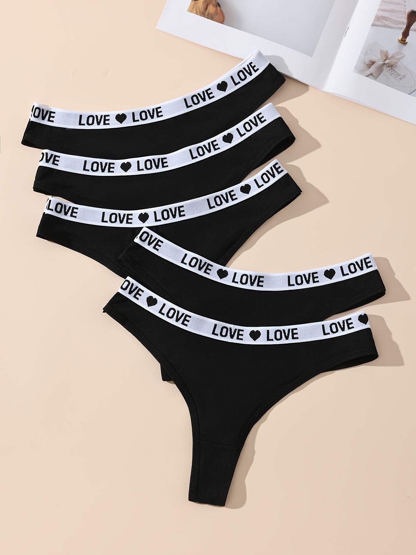 5 pairs of letter print color block thongs, sexy and comfortable breathable stretchy panties for women.