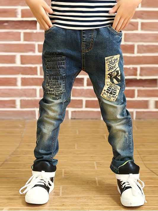 Vintage boys' casual jeans with colorful letter prints, elastic waistband, durable construction for everyday wear in spring or fall by IENENS.