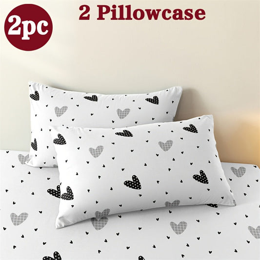 Two geometric print pillowcases made from soft and breathable polyester microfiber. These pillowcases are machine washable and feature an envelope closure for easy use. Perfect for adding a stylish touch to your home bedding, these pillowcases do not