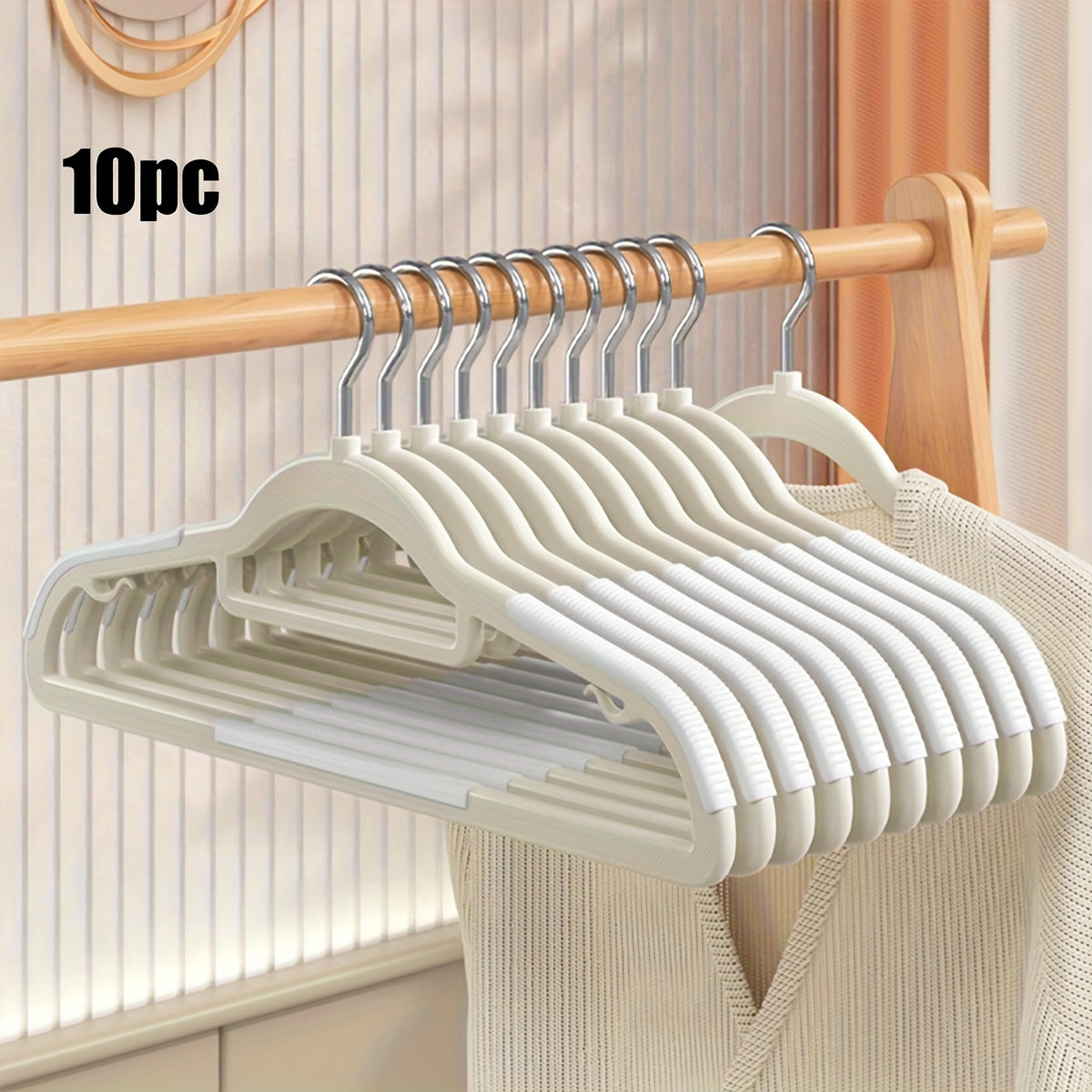 10 non-slip heavy duty clothes hangers for storage and organization in bedroom, bathroom, and home.