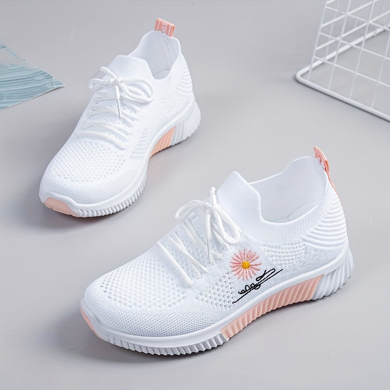 Women's breathable sneakers in chic white and pink with floral embroidery, lightweight and durable for outdoor activities.