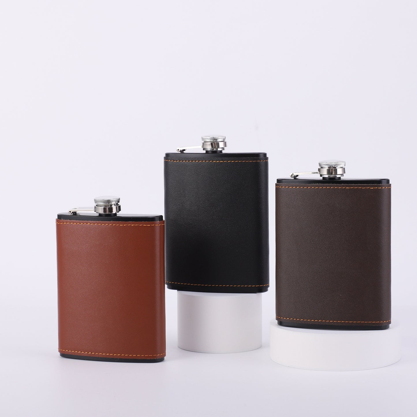 The most popular option is the 1-piece 8-ounce stainless steel hip flask with a faux leather case. Available in sleek black or brown with a polished finish, this flask is portable and perfect for outdoor camping and travel. It's ideal for storing liquor