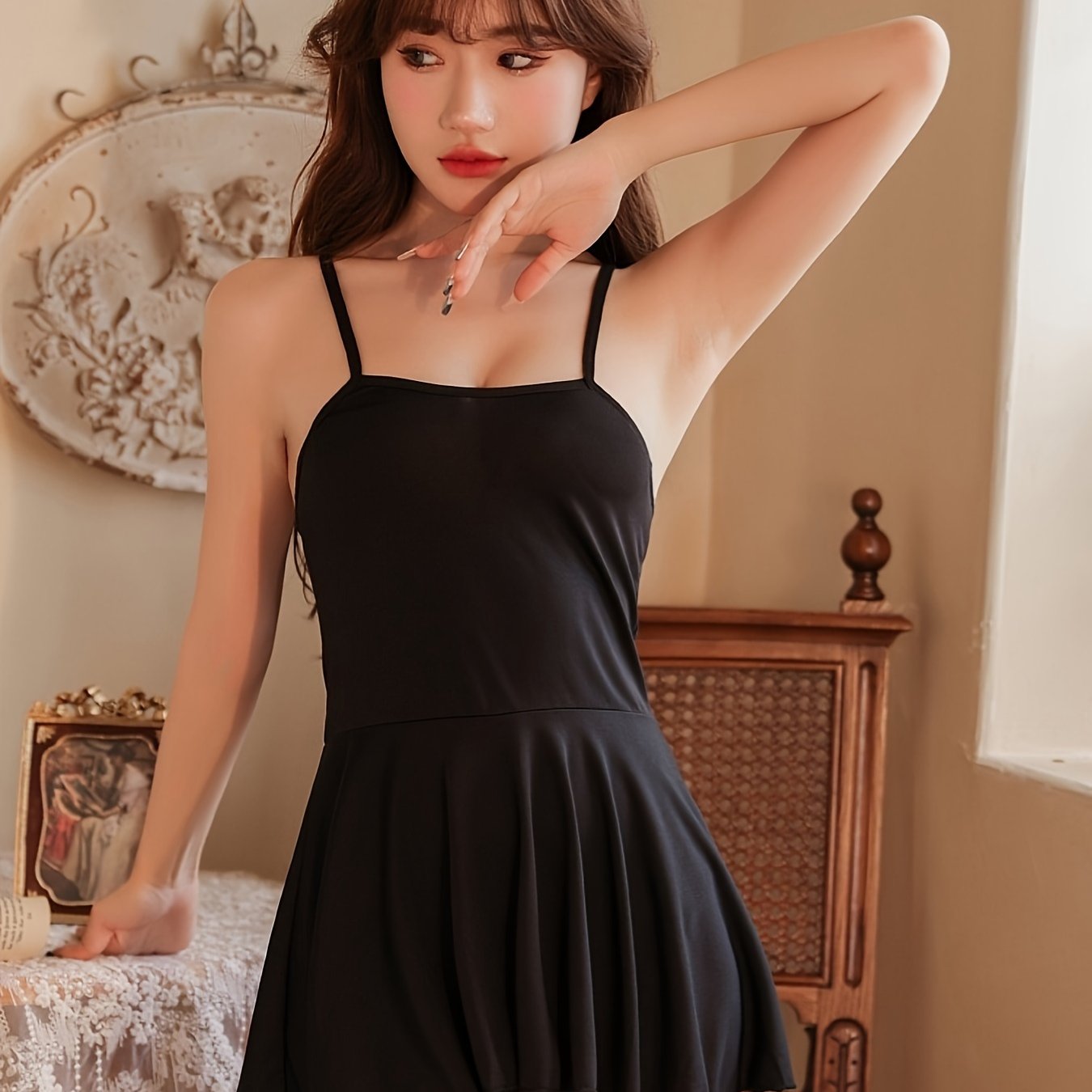 Sensual satin nightgown for women with spaghetti straps and backless design, made of polyester and elastane. Elegant and comfortable adult lingerie dress.