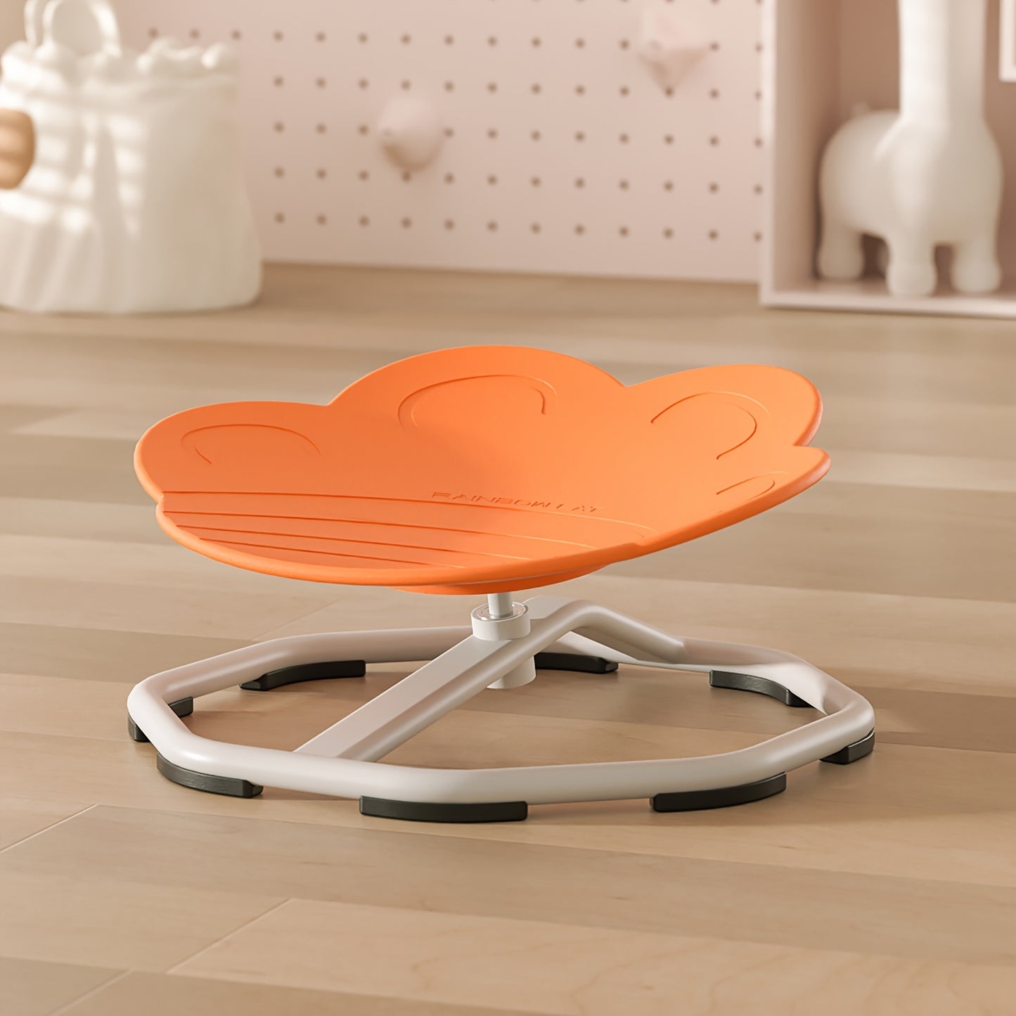 Children's red spinning chair made of durable plastic and metal, enhances coordination and focus, promotes body movement.