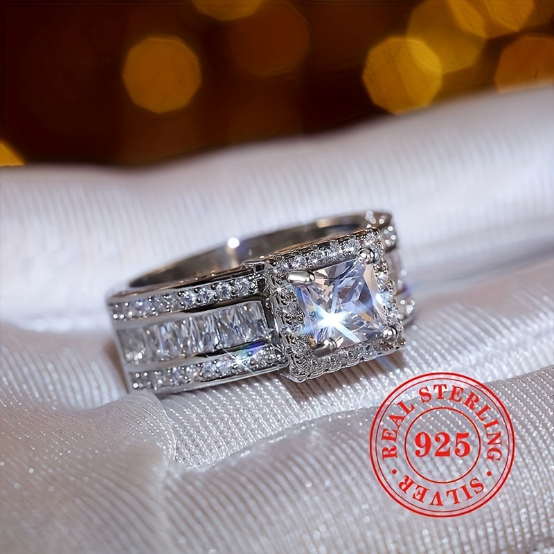 Perfect for weddings and banquets, this luxurious and high-end piece of jewelry for ladies is a stunning choice. Crafted from 7.7g of S925 sterling silver, this classic 4-prong set square cut zirconia ring sparkles beautifully. Add a touch of fashion and