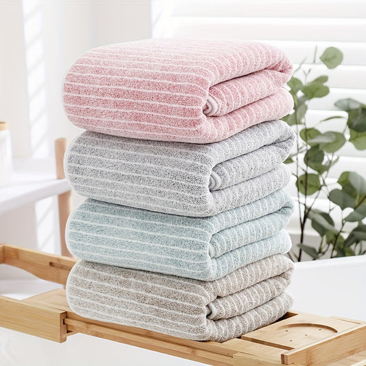 A 140cm*70cm plush bath towel perfect for home, hotel, kitchen, and more. Ultra-absorbent, soft, and gentle on skin.