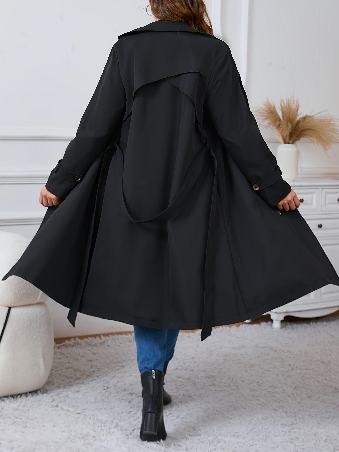 Plus size trench coat in casual style, made of 100% polyester with a double-breasted design. Features long sleeves, solid color, and lapel collar. Regular fit, non-stretch woven fabric