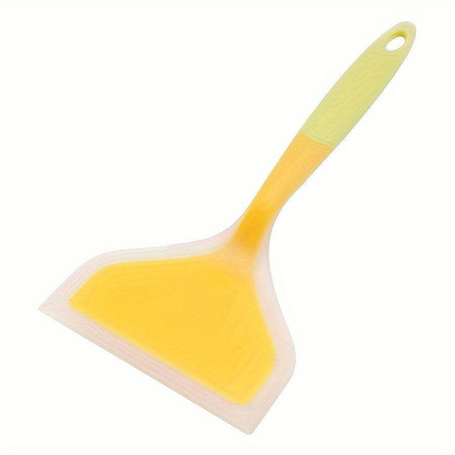 Nonstick silicone spatula turner for pancakes, eggs, fish, pizza, and steak. Heat-resistant and wide for easy flipping. Kitchen utensil accessory.